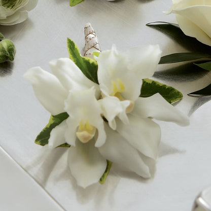 White Mini Cymbidium Boutonniere – MAYA'S FLOWER SHOP, Carmichael CA